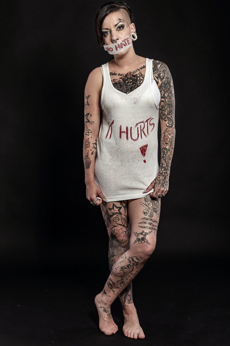body-modification-tattoos-girl-standing-in-shirt