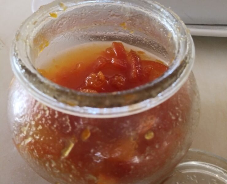 small glass jar containing marmalade