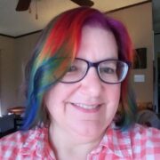 Housewyfe with rainbow dyed hair