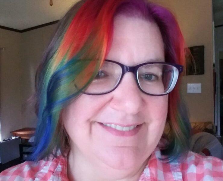 Housewyfe with rainbow dyed hair