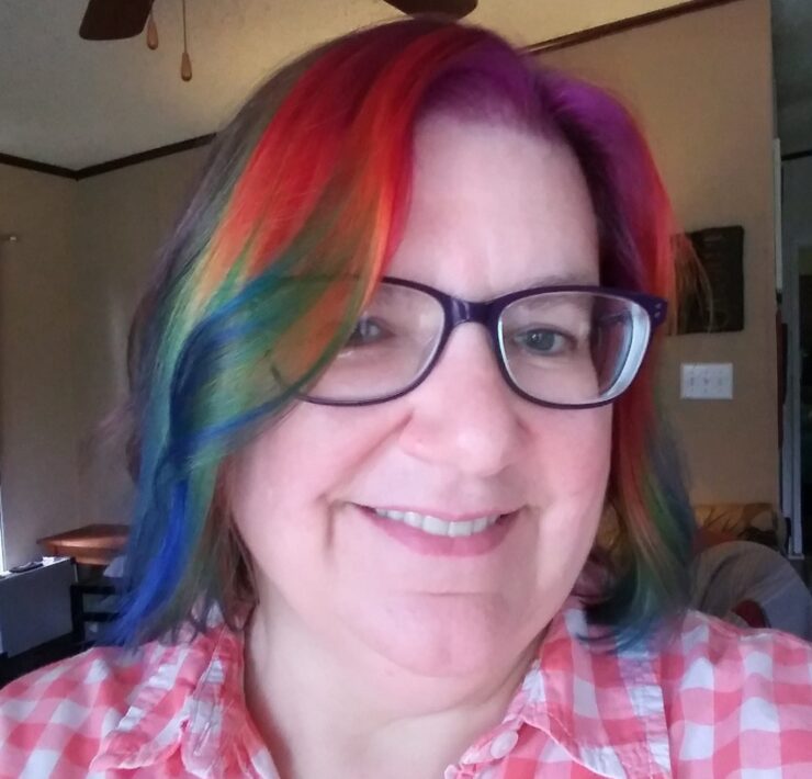 Housewyfe with rainbow dyed hair