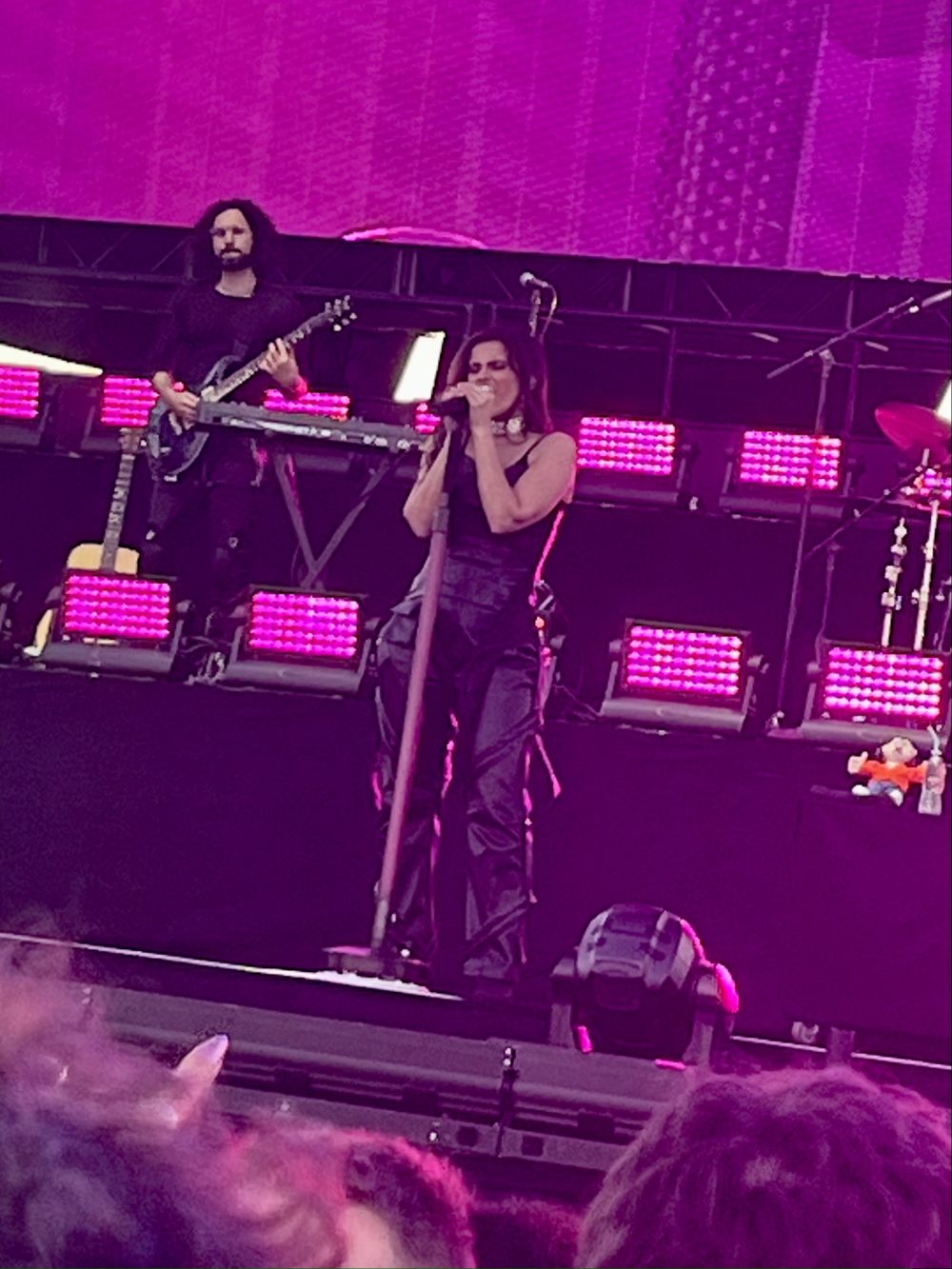 Nelly Furtado sings at the mic stand