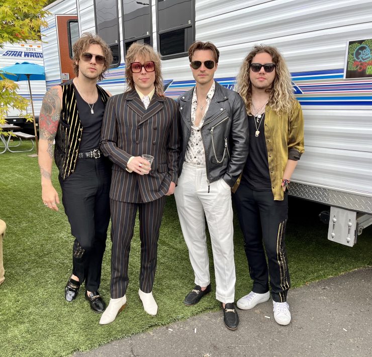 The Struts pose in front of the trailer at BottleRock Festival in May