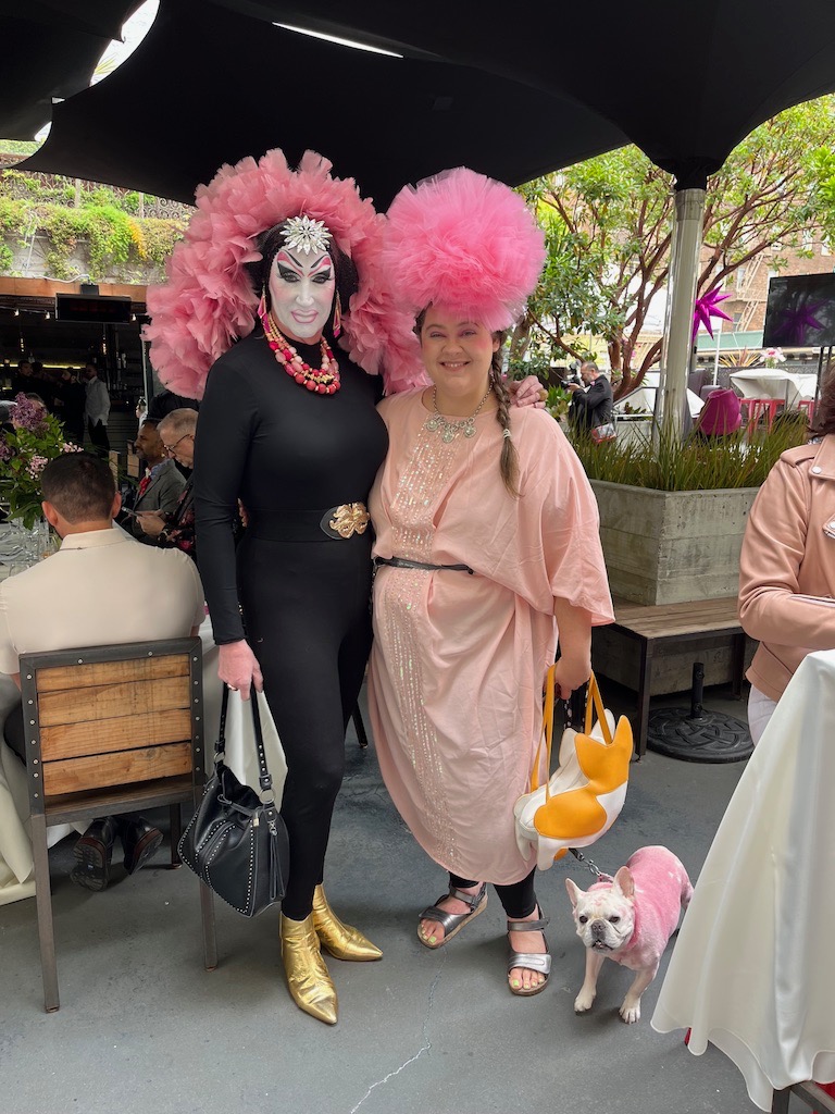 Sister Roma, vocalist Carly Ozark & her pink painted French Bulldog