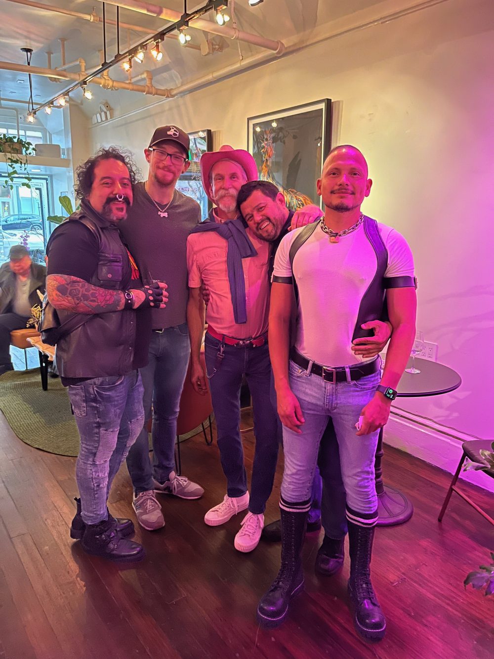 5 AMAB queers posing together