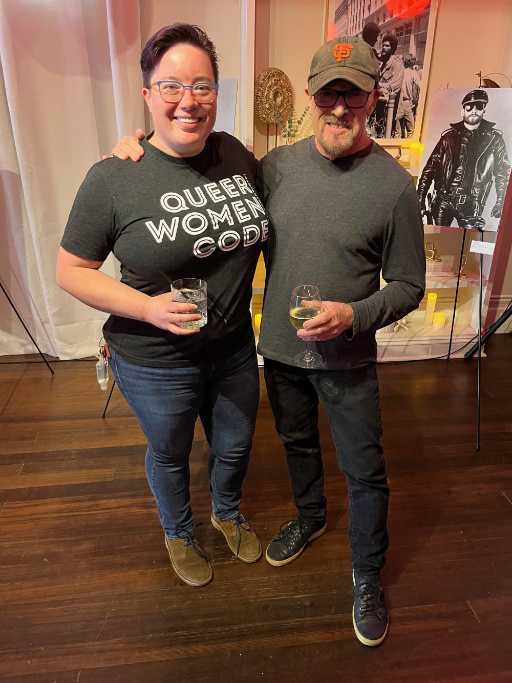 a afab queer and amab queer pose together