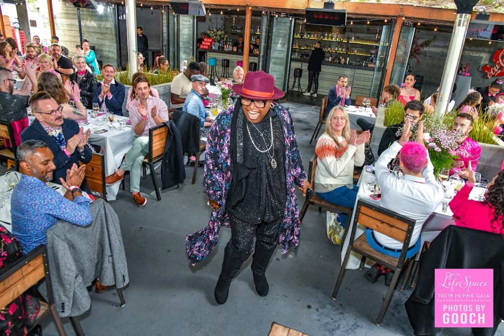 Vocalist Lampchop performing in the middle of the table space