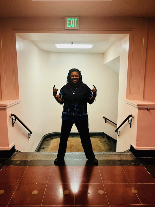 Kaleena Zanders poses with a wide legged stance