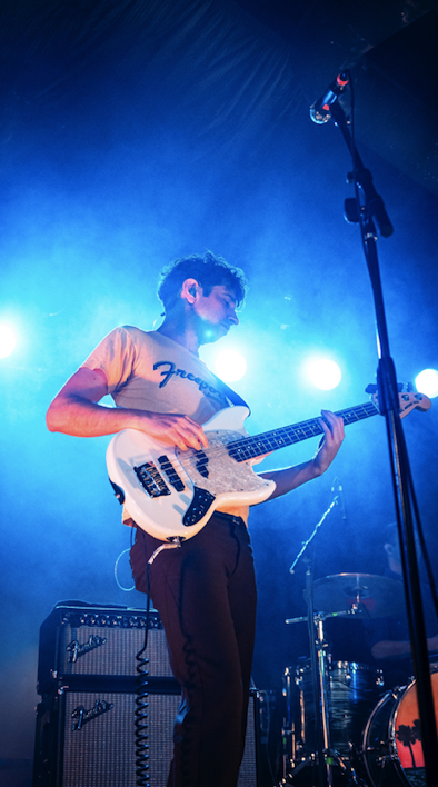 close up of Poolside's bass player