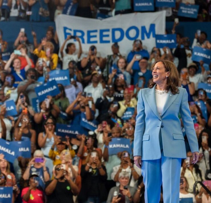 Kamala Harris in a blue suit at a recent rally