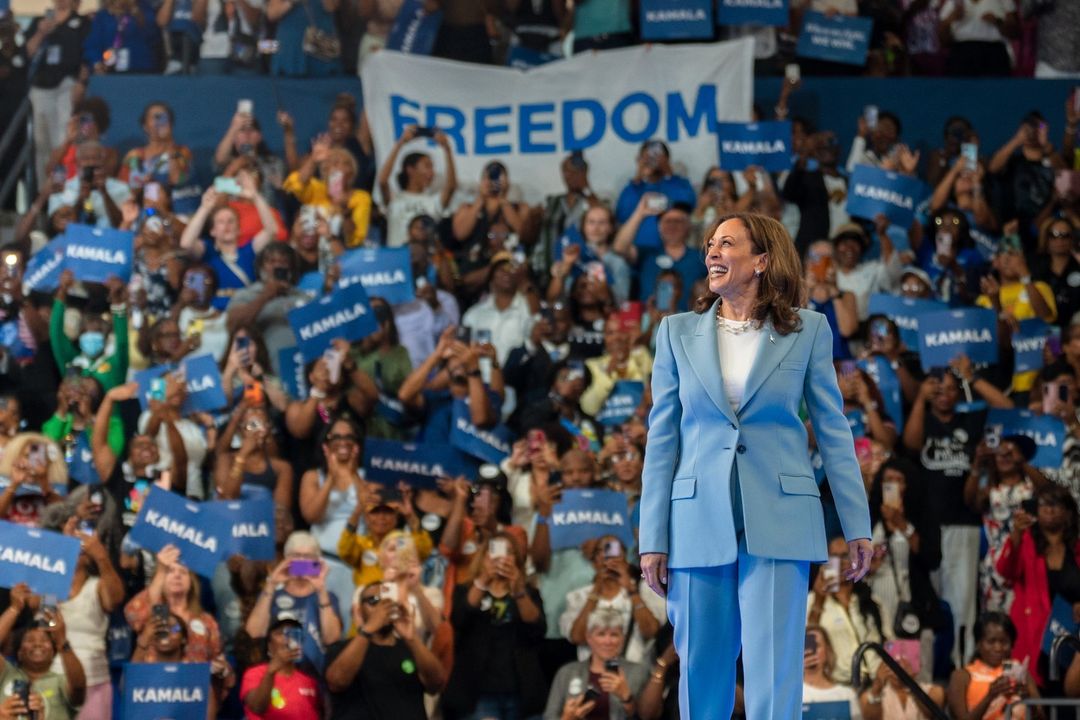 Kamala Harris in a blue suit at a recent rally