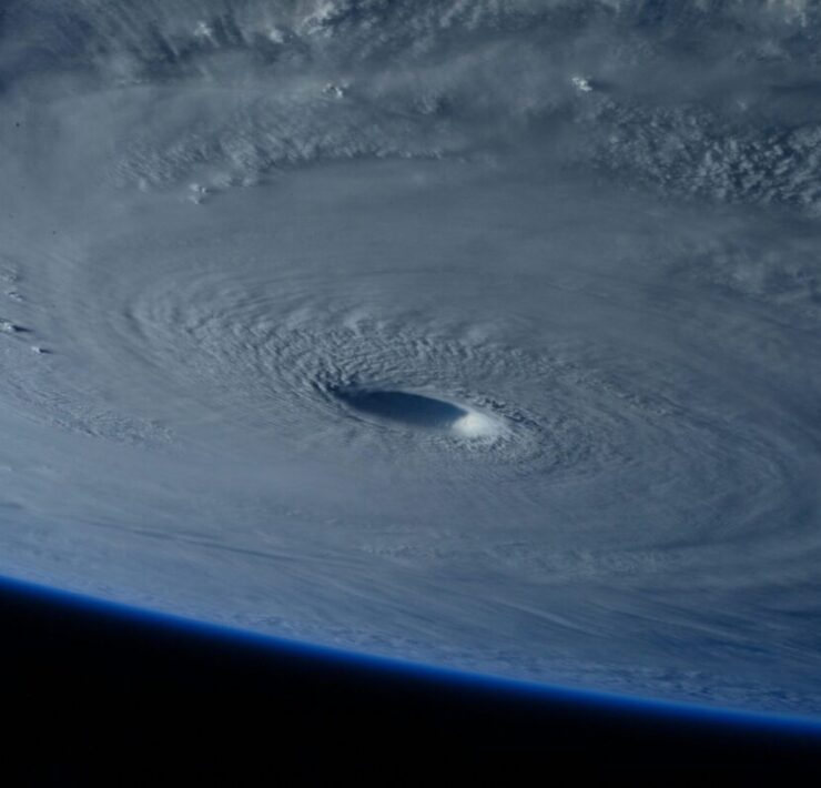 People With HIV Are Being Impacted by Climate Change: A hurricane on Earth as seen from a satellite