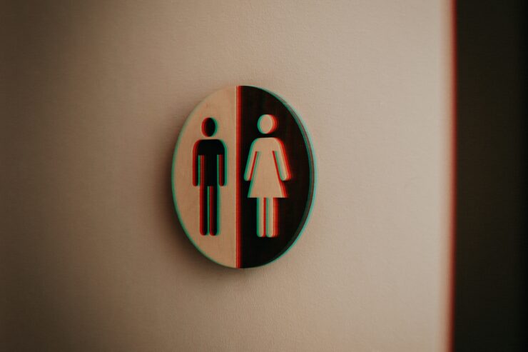 A blurry gender neutral bathroom sign, a much debated topic in politically motived transgender bathroom bans.