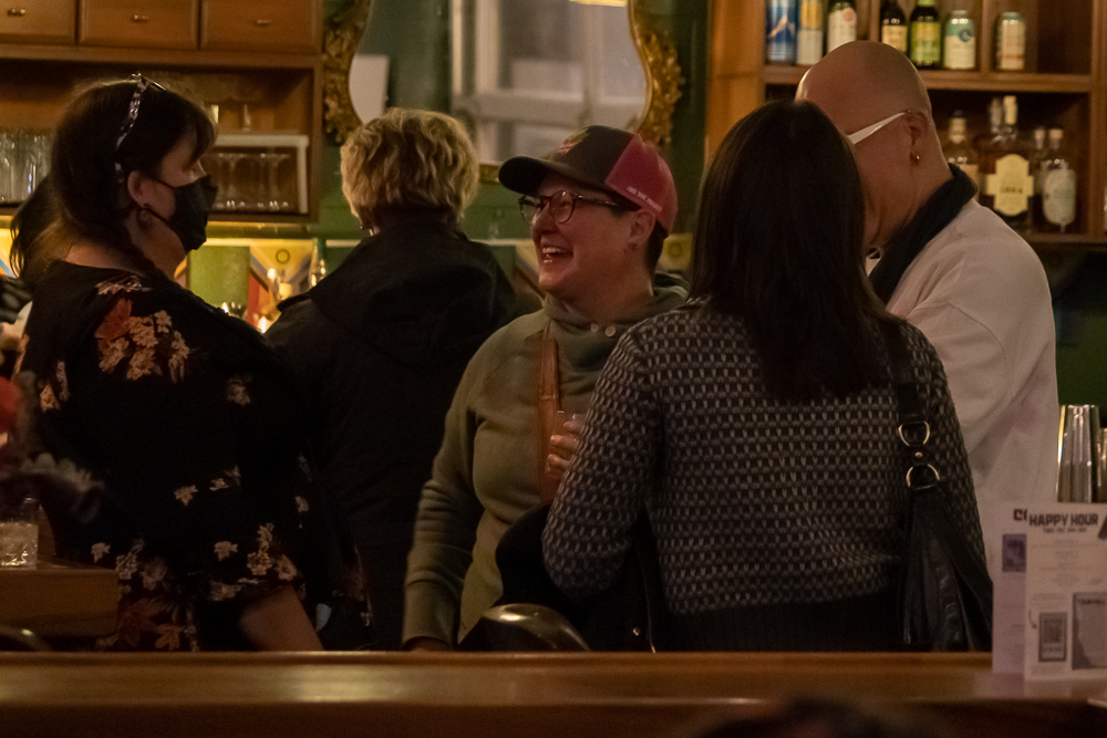 People mingle and gather at Town Hall Collaborative's panel event