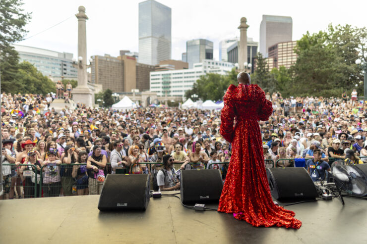 Looking out over the crowd at Pride with the Denver skyline behind