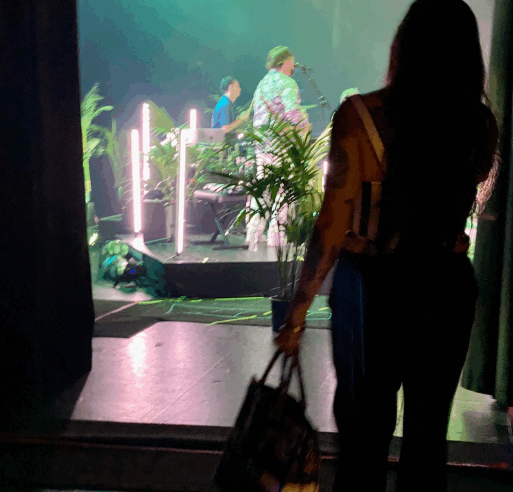 the author in the the wings of the backstage at a concert