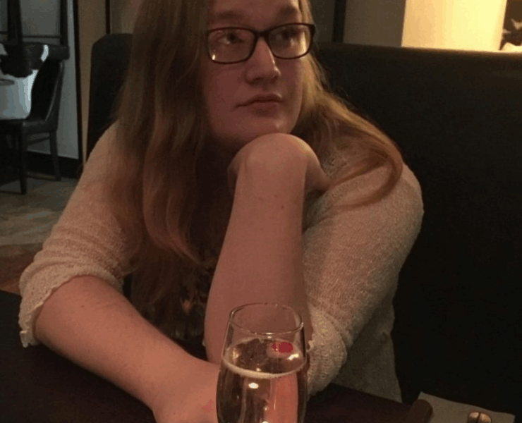 Rose Henderson almost unrecognizably feminine out for a drink