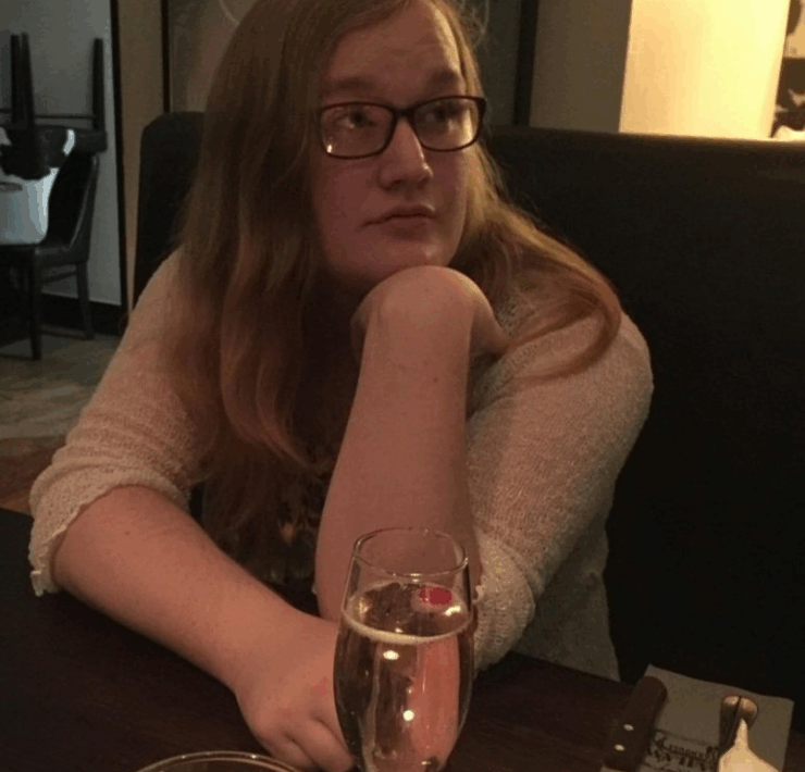 Rose Henderson almost unrecognizably feminine out for a drink