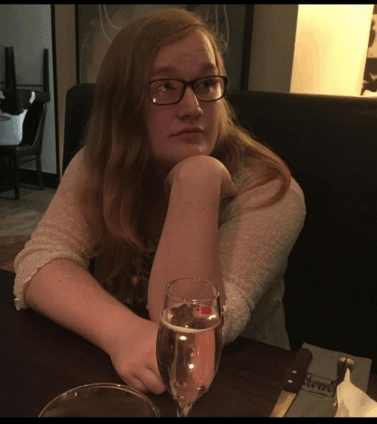 Rose Henderson almost unrecognizably feminine out for a drink